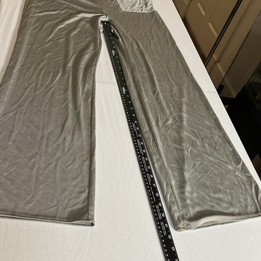 Evelyn size 12 black & white stripe pants silky with back zip one pocket